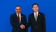 Minister of Finance H E Ali bin Ahmed Al Kuwari with Minister of Finance of the People’s Republic of China H E Lan Fo’an, on the sidelines of the 2025 Annual Meeting of the Asian Infrastructure Investment Bank.