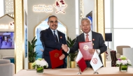 Minister of Finance, H E Ali bin Ahmed Al Kuwari with President of the Asian Infrastructure Investment Bank, H E Jin Liqun during agreement signing on the sidelines of the annual meeting of AIIB in Beijing, China.