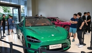 People look at a Xiaomi YU7 car at a showroom of Xiaomi store in Nanjing, in eastern China's Jiangsu province on June 26, 2025. (Photo by AFP)