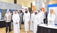  President of UDST Dr. Salem Al-Naemi and other officials during the event.