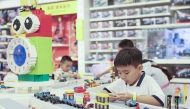 Children play with LEGO bricks at a shop of the LEGOLAND Shanghai Resort in Shanghai, east China, July 5, 2025. (Xinhua/Wang Xiang)