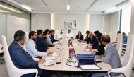 Chairman of the Committee and Board Member of QC, Engineer Ali bin Abdullatif Al-Mesned with other officials during the meeting.