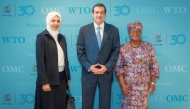 Minister of State for Foreign Trade Affairs, H E Dr. Ahmed bin Mohammed Al-Sayed with Director-General of the World Trade Organization, H E Dr. Ngozi Okonjo-Iweala.