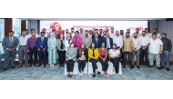 Commercial Bank officials pose for a group photo during the workshop.