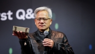 (FILES) Jensen Huang, co-founder and CEO of Nvidia Corp., speaks during a news conference in Taipei on May 21, 2025. (Photo by I-Hwa Cheng / AFP)
