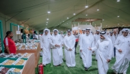 Assistant Undersecretary for Agricultural Affairs and Food Security at the Ministry of Municipality Eng. Fahad Mohammed Al-Qahtani, and the representative of the Private Engineering Office Abdulrahman Mohammed Al-Naama with other officials touring the festival.