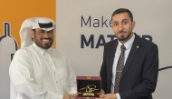 Acting Director General of Qatar Post Hamad AlFahaida (left) with Director General of the Syrian Post Emad Alden Hamad. 
