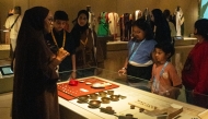 Kids listening to an official during a session of the programme.