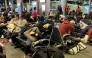 Passengers wait to board a Southwest flight in Dallas on Dec. 25, 2022, after the flight was delayed six hours because of a shortfall of flight attendants. The flight was then canceled. Photo credit: John McDonnell/The Washington Post
