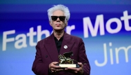 US director Jim Jarmusch poses with the Golden Lion for Best Film he reveived for 'Father Mother Sister Brother' during the award ceremony of the 82nd Venice Film Festival on September 6, 2025 at Venice Lido. (Photo by Tiziana FABI / AFP)
