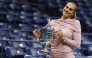 Aryna Sabalenka poses with the championship trophy after defeating Amanda Anisimova of the United States in the Queens borough of New York City. Sarah Stier/Getty Images/AFP