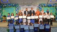 School officials and students during the Annual Prize Distribution Ceremony.