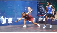 Egypt's Hania El Hammamy (left) in action against Sivasangari Subramaniam of Malaysia.