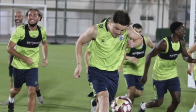 Al Kharaitiyat players take part in a training session.