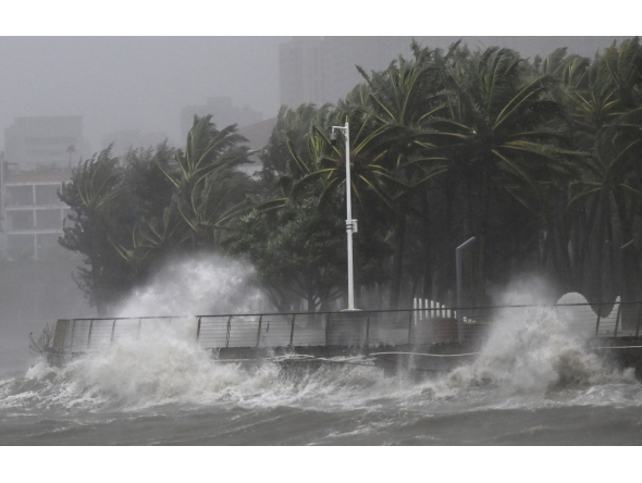 This photo taken on Oct. 5, 2025 shows high waves in a seashore area of Haikou, south China's Hainan Province. Xinhua/Guo Cheng