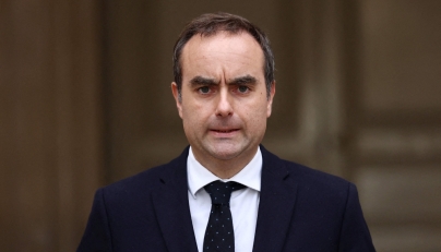 Outgoing French Prime Minister Sebastien Lecornu delivers a statement in Paris, on October 6, 2025. (Photo by Stephane Mahe / Pool / AFP)