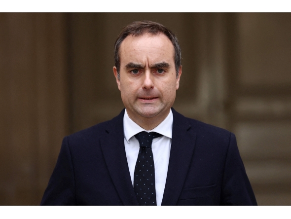 Outgoing French Prime Minister Sebastien Lecornu delivers a statement in Paris, on October 6, 2025. (Photo by Stephane Mahe / Pool / AFP)