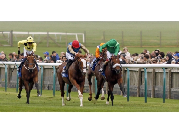 James Doyle and Damysus on their way to win the Too Darn Hot Darley Stakes at Newmarket, yesterday. 