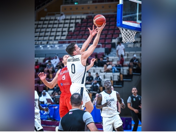 Al Sadd's Christos Bratsiakos drives to score during the match against Al Arabi.