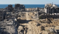 An aerial view shows the Al-Maqussi Towers district, heavily damaged by massive Israeli bombardment over the past two years, in northwestern Gaza City on October 15, 2025 (Photo by AFP)
