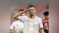 Al Arabi's Pablo Sarabia celebrates after scoring his team's fourth goal.