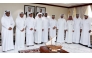 Minister of Municipality H E Abdullah bin Hamad bin Abdullah Al Attiyah (fourth right) with fishermen during the meeting