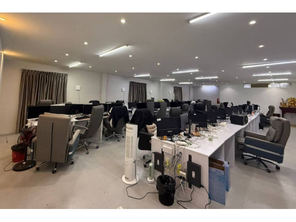 This undated handout from Agence Kampuchea Press (AKP) released on October 23, 2025 shows computer equipment during a raid on a scam centre in Phnom Penh. Photo by HANDOUT / AGENCE KAMPUCHEA PRESS (AKP) / AFP