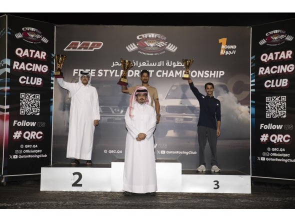 Qatar Racing Club's Director General Sheikh Jabor bin Khalid Al Thani poses for a photo with the podium winners.
