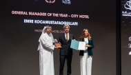 Radisson Blu Hotel, Doha General Manager, Emre Kocamustafaogullari receiving the award during the event.