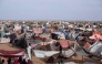 Makeshift shelters erected by displaced Sudanese who fled El-Fasher after the city fell to the Rapid Support Forces (RSF), make up the Um Yanqur camp, located on the southwestern edge of Tawila, in war-torn Sudan's western Darfur region on November 3, 2025. (Photo by AFP)