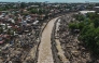 This aerial photo shows damaged houses in the aftermath of Typhoon Kalmaegi in Talisay, in Cebu province on November 5, 2025. Photo by Jam STA ROSA / AFP