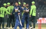 Sri Lanka's Maheesh Theekshana (CL) and Sri Lanka's Asitha Fernando (CR) shake hands with Pakistan's players at the end of the first one-day international (ODI) cricket match between Pakistan and Sri Lanka at the Rawalpindi Cricket Stadium in Rawalpindi on November 11, 2025. (Photo by Aamir QURESHI / AFP)