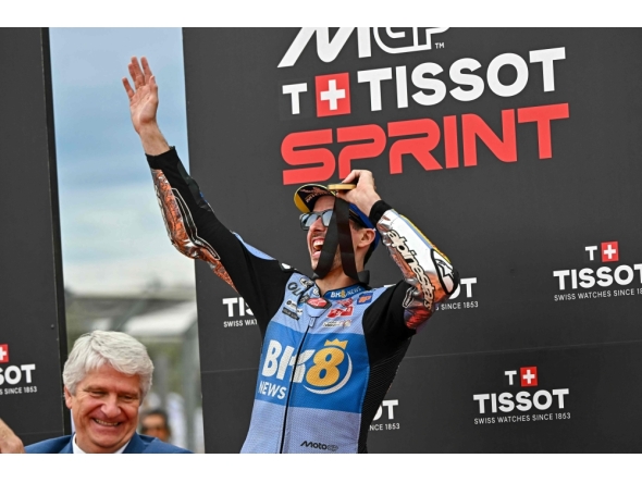 Spanish MotoGP rider Alex Marquez celebrates his first-place finish in the sprint race ahead of the MotoGP Valencia Grand Prix at the Ricardo Tormo racetrack in Cheste on November 15, 2025. Photo by Javier Soriano / AFP