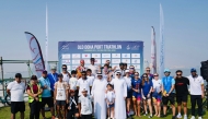 Participants receiving awards at the Qatar Triathlon League for the 2025/2026 that took place at Old Doha Port