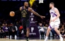 LeBron James #23 of the Los Angeles Lakers dribbles the ball against Svi Mykhailiuk #10 of the Utah Jazz during the second half on November 18, 2025 in Los Angeles, California. Ronald Martinez/Getty Images/AFP 