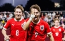 Austria's Hasan Deshishku (right) celebrates after scoring a goal. PIC: OEFB