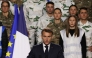 France's President Emmanuel Macron (C) delivers a speech to unveil a new national military service at the military base in Varces, French Alps, on November 27, 2025. (Photo by Thomas Padilla / Pool / AFP)
 