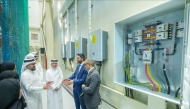 Officials during the visit to Al Taadhod Trading and Contracting Group building in Birkat Al Awamer area.