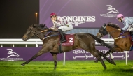 Jockey Lukas Delozier celebrates after guiding Bint Mohaather to win the QA Listed Qatar Oaks. Pictures: Juhaim/QREC