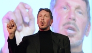 Larry Ellison, CEO of Oracle Corporation, gestures as he makes a speech during the New Economy Summit 2014 in Tokyo on April 9, 2014. Photo by TORU YAMANAKA / AFP