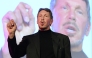 Larry Ellison, CEO of Oracle Corporation, gestures as he makes a speech during the New Economy Summit 2014 in Tokyo on April 9, 2014. Photo by TORU YAMANAKA / AFP