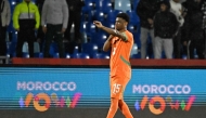 Ivory Coast's forward #15 Amad Diallo celebrates scoring the team's first goal during the Africa Cup of Nations (CAN) Group F football match between Ivory Coast and Mozambique at Marrakesh Stadium in Marrakesh on December 24, 2025. (Photo by Khaled Desouki / AFP)