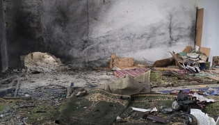 This handout photograph released by the official Syrian Arab News Agency (SANA) on December 26, 2025, shows the aftermath of the explosion inside Imam Ali ibn Abi Talib Mosque in the Wadi al-Dahab neighborhood of Homs. A deadly explosion hit a mosque in a predominantly Alawite area of Syria's Homs on December 26, said authorities who reported at least six people killed. (Photo by HANDOUT / SANA / AFP