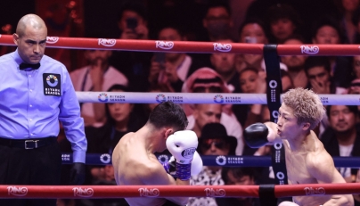 Mexico's boxer David Picasso (L) fights Japan's boxer Naoya Inoue in the 