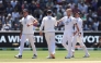 England’s Ben Stokes (second right) congratulates his teammates at the end of the innings during the second day at the Melbourne Cricket Ground. 