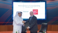 CMU-Q’s Dean Michael Trick and Executive Director of the ME Council Dr. Khalid Al-Jaber during the signing ceremony. 