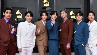 (Files) South Korean boy band BTS arrives for the 64th Annual Grammy Awards at the MGM Grand Garden Arena in Las Vegas on April 3, 2022. (Photo by Angela Weiss / AFP)
 