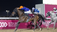 Action from the Al Kharrara Cup feature race won by Posuelo Py at Al Rayyan Racecourse yesterday. PICS: Juhaim/QREC   