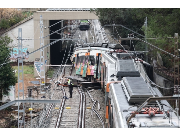 A picture taken on January 21, 2026 shows a regional service train the morning after it collided with a collapsed wall, killing one person and injuring seriously five, between Sant Sadurni d'Anoia and Gelida, near Barcelona.