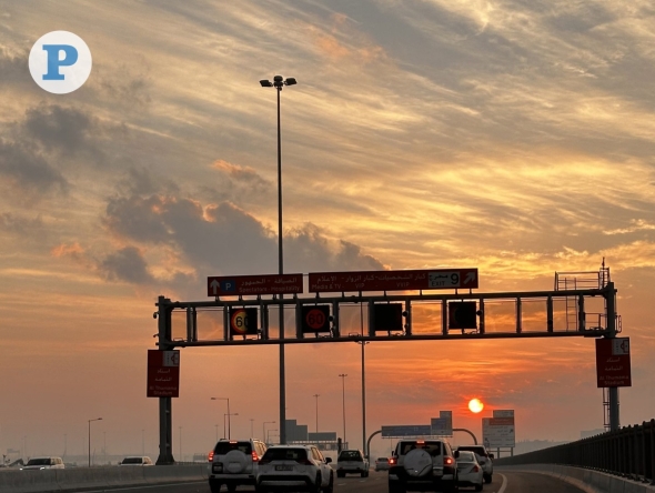 Early morning sunrise casts a golden glow over Al Majd Road in Doha. Picture by Shammas Kalathil / The Peninsula
